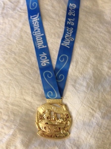 10K Finisher's Medal and ribbon