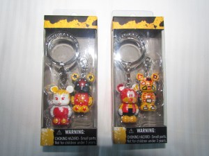 Keychains with different Vinylmation designs; two of the possibilities are shown.