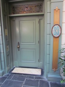 We wait by the door while Mia bribes some guards, or something